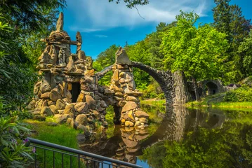 Wandcirkels Rakotzbrücke Diabelski Most (niem. Rakotzbrücke) w Kromlau, Niemcy  © grzegorz_pakula