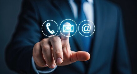 Businessman touching communication icons phone email at sign suit finger