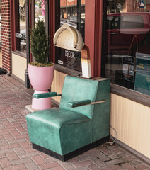 vintage hair drying chair outside on a sidewalk in Conroe