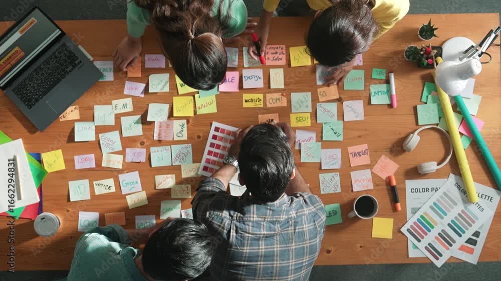Poster group of creative team looking and planning idea while manager holding sticky notes and presenting m