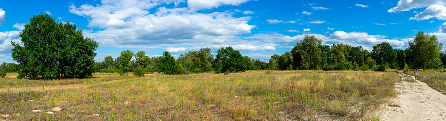 Muromets Park in Kyiv, Ukraine, winds through scenic greenery, offering a peaceful route for cyclists and nature lovers.