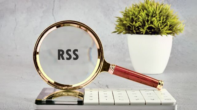RSS Aircraft Animation through a magnifying glass on a gray wall. Social media concept. 4K