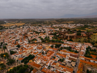 Drone view of Silves town with medieval castle and red rooftops, Algarve, Portugal