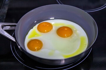 Free-range eggs fried in olive oil, a strong and healthy food. Real food.