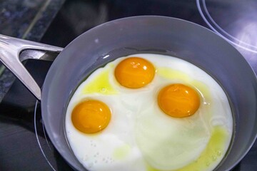 Free-range eggs fried in olive oil, a strong and healthy food. Real food.