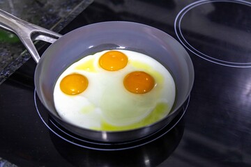 Free-range eggs fried in olive oil, a strong and healthy food. Real food.