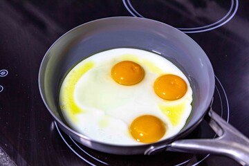 Free-range eggs fried in olive oil, a strong and healthy food. Real food.