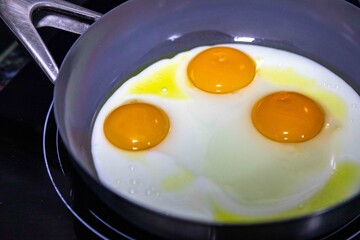 Free-range eggs fried in olive oil, a strong and healthy food. Real food.