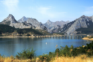 Riaño Reservoir with Mountain Peaks and Bridge