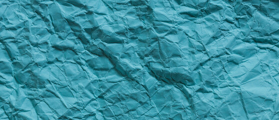Turquoise Wrinkled Paper Background with Grunge Surface Detail