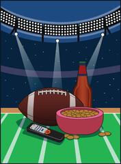 A football and snacks in the middle of a sports stadium.