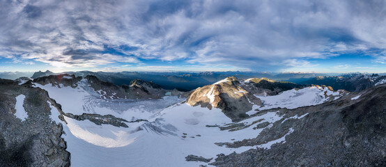 Panoramic View of Snow-Covered Mountains During Sunrise in BC, Canada