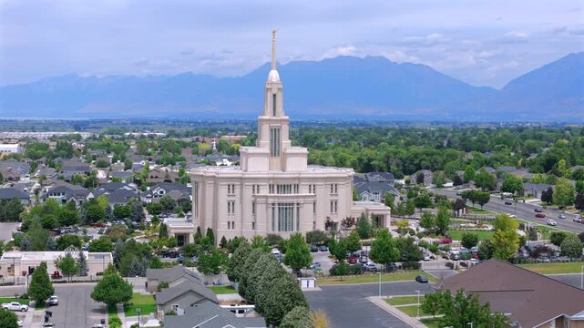 Experience stunning aerial views of the Payson Utah Mormon Temple, a significant site for members of The Church of Jesus Christ of Latterday Saints, where they gather for worship and events