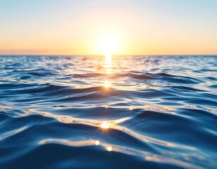 Sunrise over tranquil ocean waves