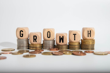 Coin in glass bottle with money stack step up growing growth saving money