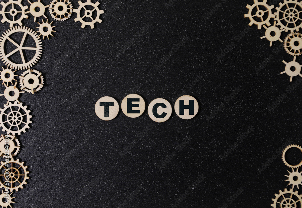 Poster hands typing on laptop with programming code on screen, representing software development.
