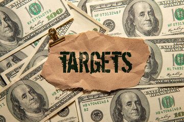 scrap of paper, money and text targets