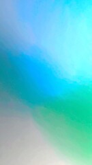 Soft gradient of pastel blues and greens