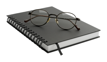 Creative workspace essentials black notebook with glasses for productive mindset minimalist professional setting. Cut out PNG