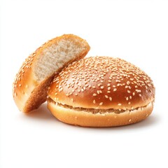 A close-up shot of sesame seed hamburger buns, one whole and one sliced open, showcasing the texture and details.
