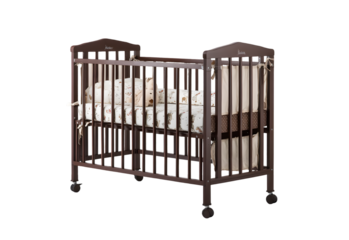 Wooden baby crib with wheels and bedding.