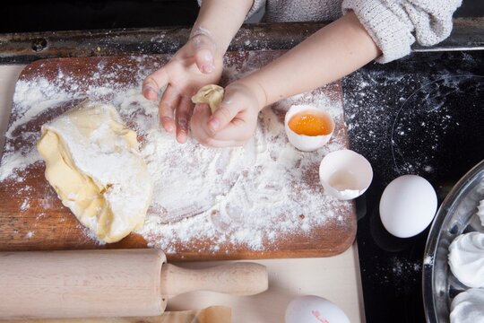 woman hands preparing dough