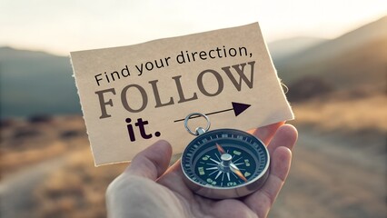 Hand Holding Compass with Motivational Message about Direction