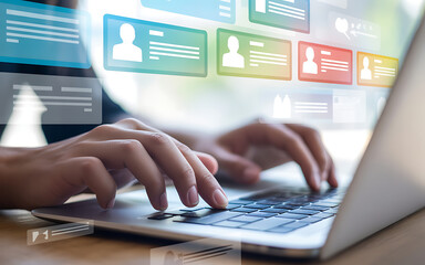 Hands typing on a laptop keyboard with virtual user profiles displayed, representing online communication and social media networking concept