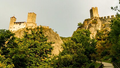 Fototapeta premium Medieval castle nestled in a mountainous landscape