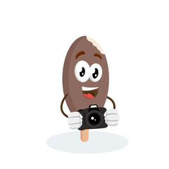 A chocolate popsicle character holding a camera, ready to take a picture