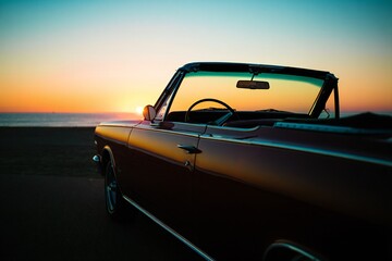 Beach Background Classic Convertible Car at Sunset Ocean Beach Drive Road Trip