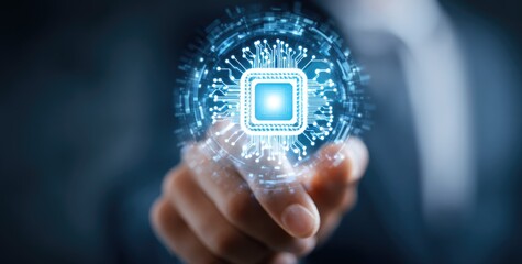 A person's fingertip hovers over a glowing, holographic computer chip graphic, its intricate circuit layout visible