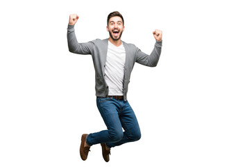 Excited caucasian man jumping for joy and celebrating success, isolated on transparent background