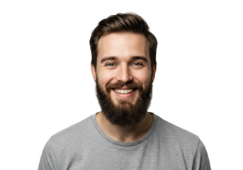 Young professional man with beard smiling confidently, wearing a grey tshirt, isolated on transparent background