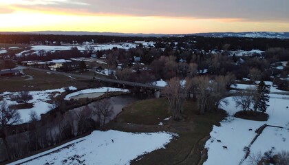 Aerial Sunset View of River and Town
