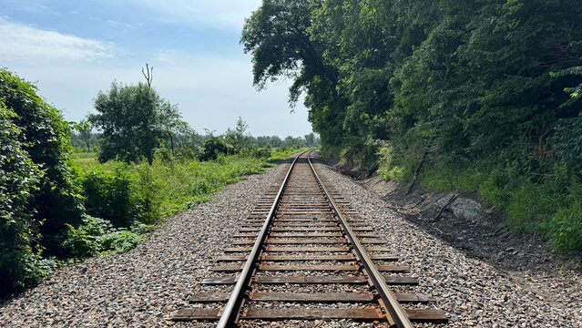 train tracks through the countryside