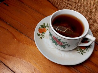 cup of tea on wooden table