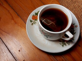 cup of tea on wooden table