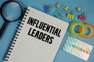 Influential Leaders text with magnifying glass on blue background