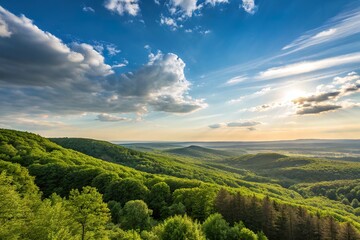 Obraz premium Lush green hills under a vibrant sky at sunset, showcasing nature's beauty and tranquility