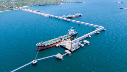 LPG ship, Oil tanker ship. Red Oil Tanker ranchored in Gas terminal gas tanks for storage....