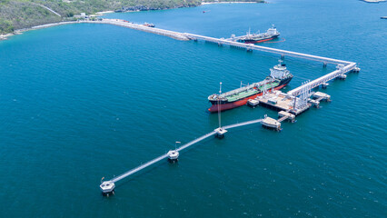 LPG ship, Oil tanker ship. Red Oil Tanker ranchored in Gas terminal gas tanks for storage....