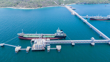 LPG ship, Oil tanker ship. Red Oil Tanker ranchored in Gas terminal gas tanks for storage....