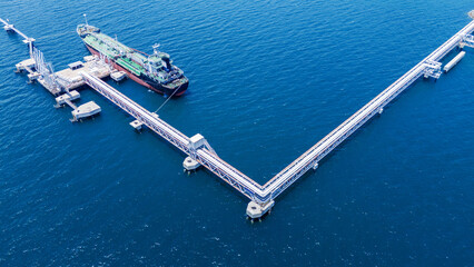 LPG ship, Oil tanker ship. Red Oil Tanker ranchored in Gas terminal gas tanks for storage....