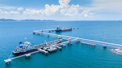 LPG ship, Oil tanker ship. Red Oil Tanker ranchored in Gas terminal gas tanks for storage....