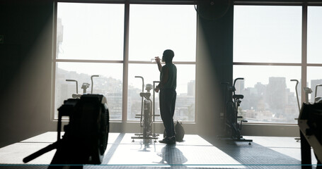 Fitness, mature man or drinking water at gym for hydration, workout recovery or nutrition....
