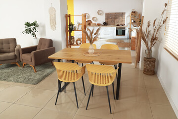 Interior of modern studio apartment with dining table