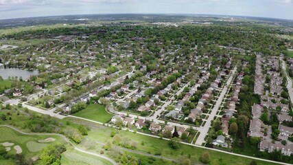 Aerial view of typical suburb in europe residential neighborhood with beautiful Golden hour sunrise