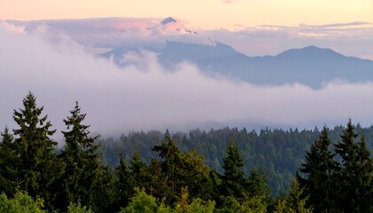Obraz premium Misty mountain landscape at sunset