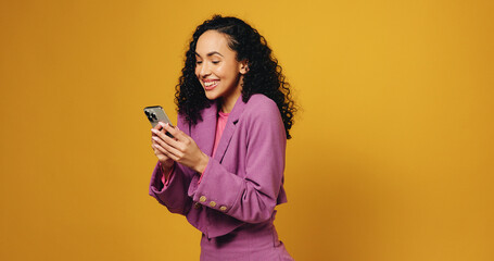 Studio, excited and woman with smartphone, online and notification for good news or job...